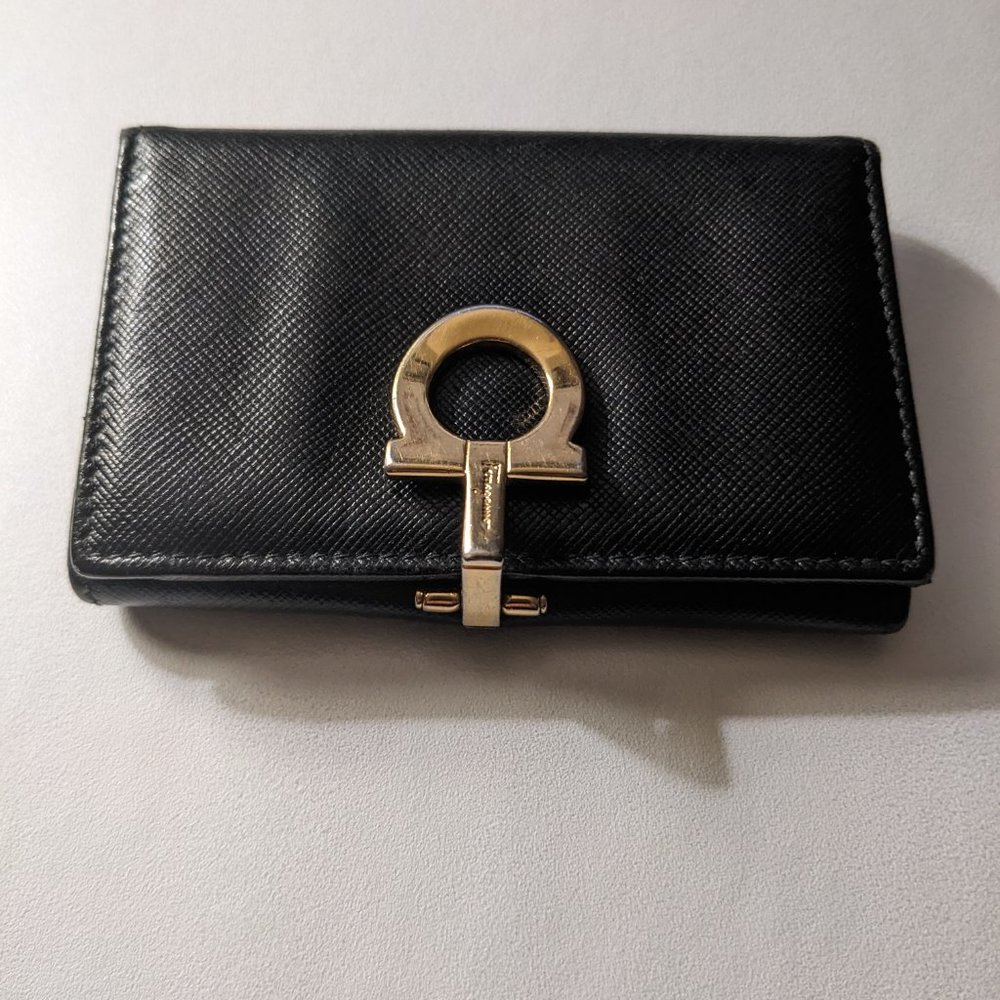 Salvatore Ferragamo wallet with Iconic logo clasp in excellent condition